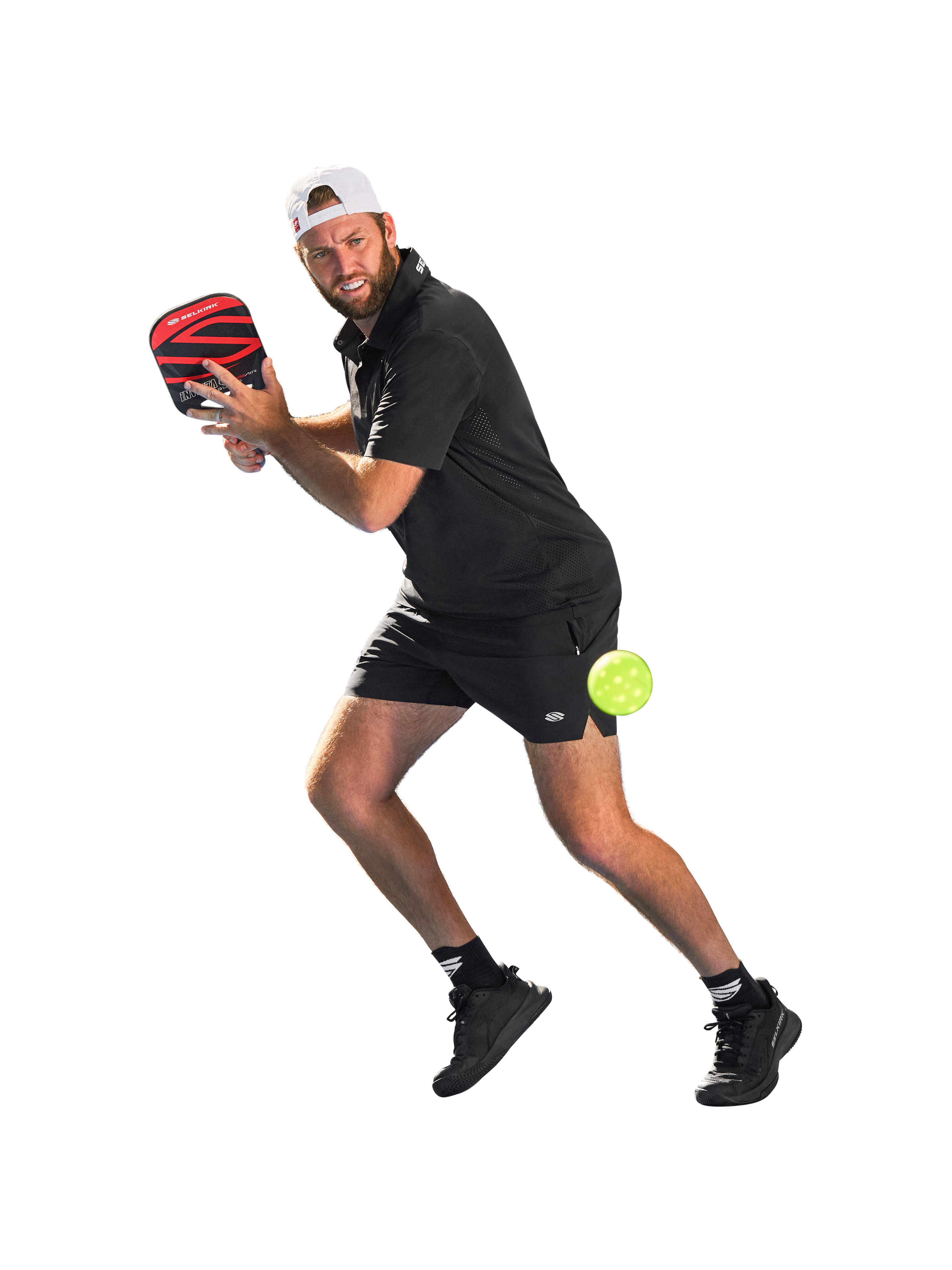 Jack Sock, a pro pickleball player, in action with a paddle and ball